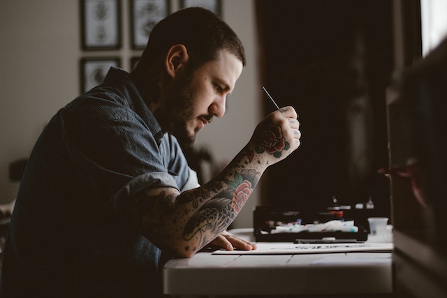 man thinking at desk